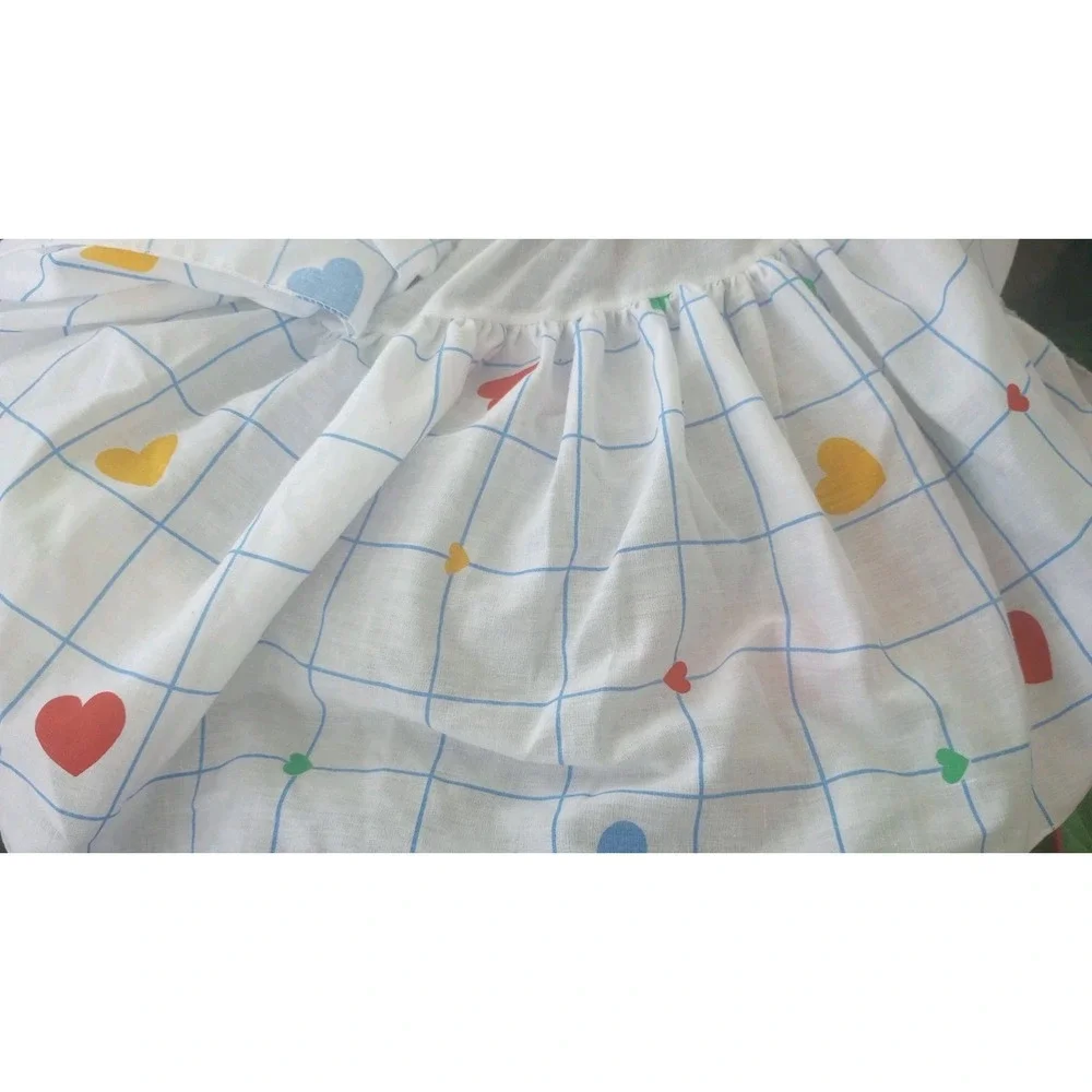 Vintage 1980s crib skirt Primary colors HEARTS and grid pattern